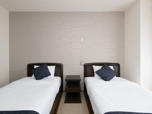 Imagen de la habitación del Hotel OYO Business Hotel Koyo. Foto 9