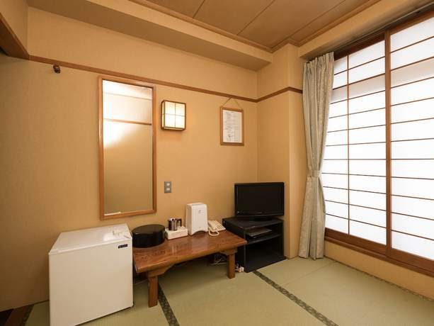 Imagen de la habitación del Hotel OYO Business Hotel Koyo. Foto 11