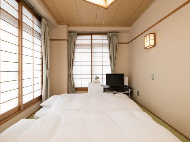 Imagen de la habitación del Hotel OYO Business Hotel Koyo. Foto 12