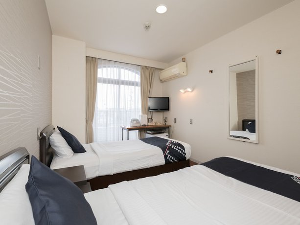 Imagen de la habitación del Hotel OYO Business Hotel Koyo. Foto 13