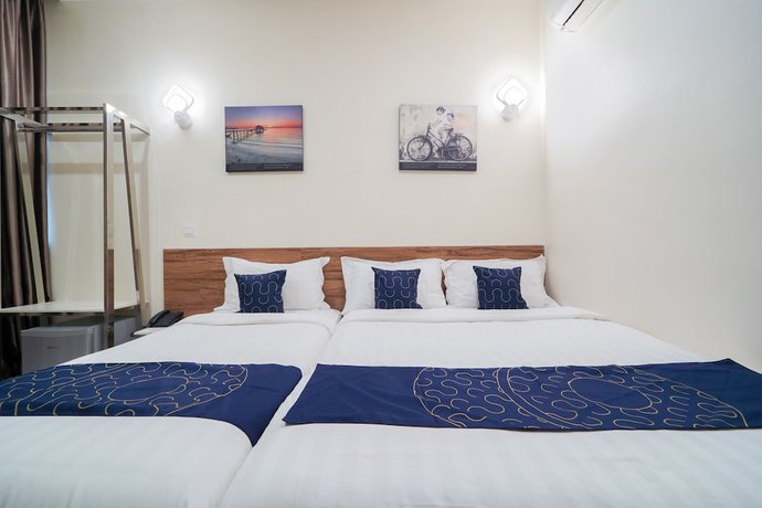 Imagen de la habitación del Hotel OYO Capital O 89647 Atta Hotel. Foto 5