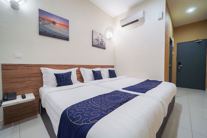 Imagen de la habitación del Hotel OYO Capital O 89647 Atta Hotel. Foto 8