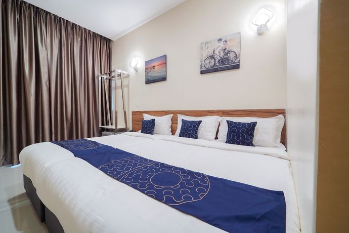 Imagen de la habitación del Hotel OYO Capital O 89647 Atta Hotel. Foto 14
