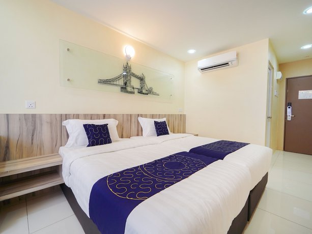 Imagen de la habitación del Hotel OYO Capital O 89685 Atta Hotel Bukit Mertajam. Foto 7