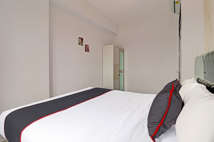 Imagen de la habitación del Hotel OYO Capital O 91631 M-square Apartement. Foto 11