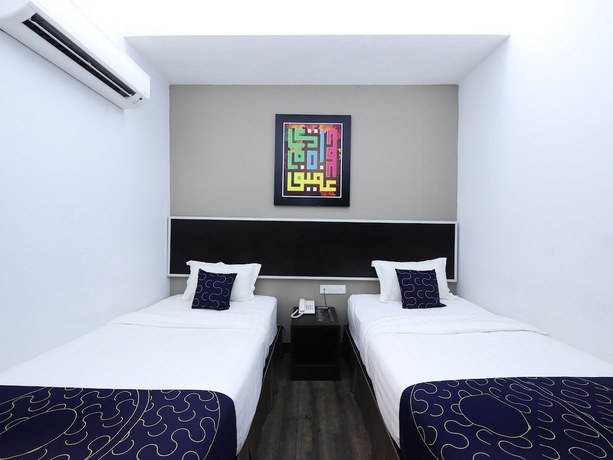 Imagen de la habitación del Hotel OYO Capital O 978 Midaris Hotel. Foto 2