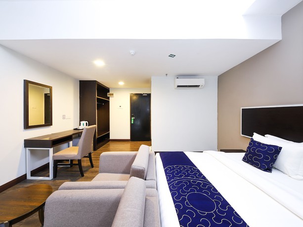 Imagen de la habitación del Hotel OYO Capital O 978 Midaris Hotel. Foto 3