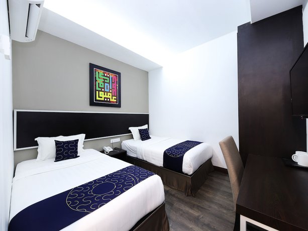 Imagen de la habitación del Hotel OYO Capital O 978 Midaris Hotel. Foto 7