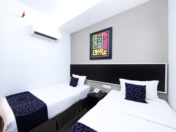 Imagen de la habitación del Hotel OYO Capital O 978 Midaris Hotel. Foto 10