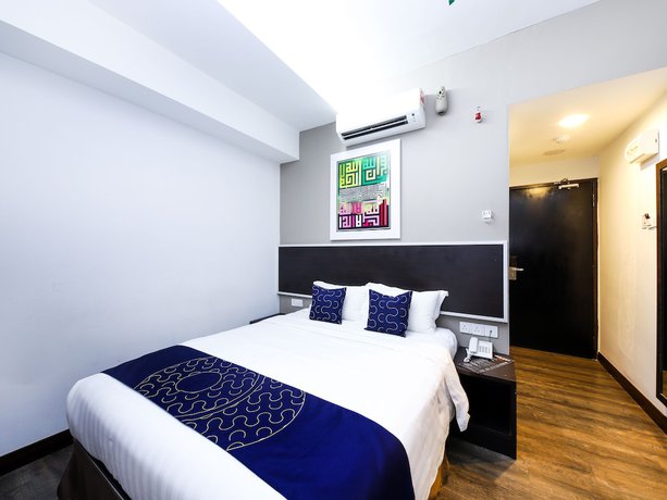 Imagen de la habitación del Hotel OYO Capital O 978 Midaris Hotel. Foto 11