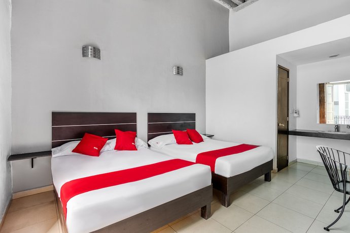 Imagen de la habitación del Hotel OYO Casona Poblana. Foto 4