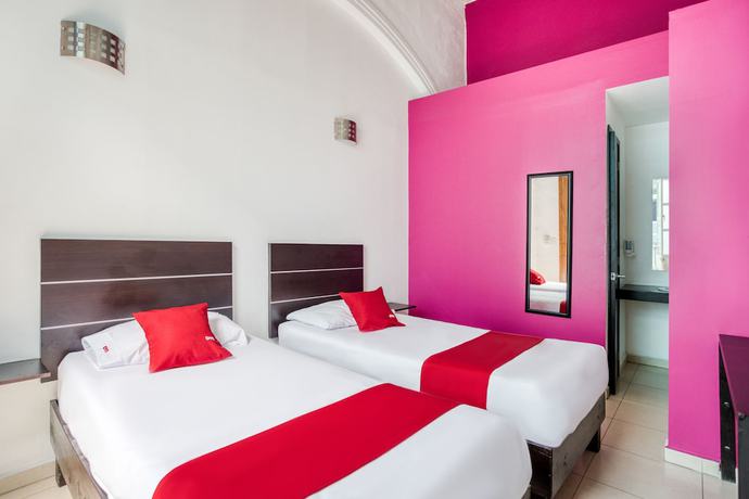 Imagen de la habitación del Hotel OYO Casona Poblana. Foto 11