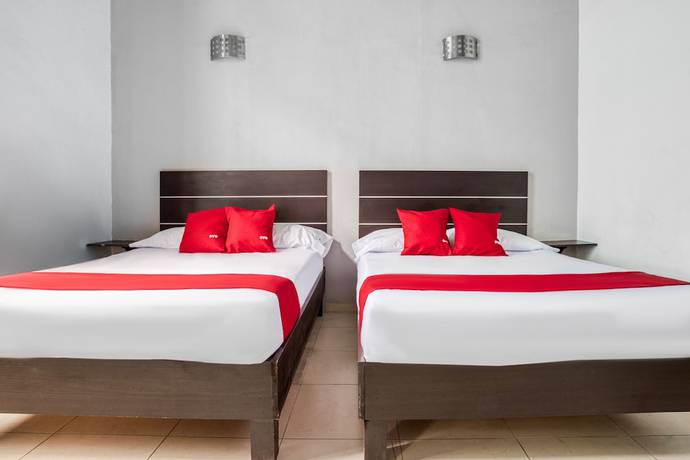Imagen de la habitación del Hotel OYO Casona Poblana. Foto 17