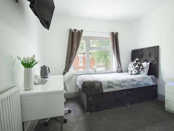 Imagen de la habitación del Hotel OYO Clamart. Foto 7