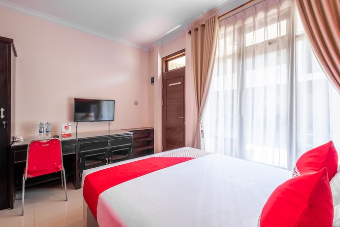 Imagen de la habitación del Hotel OYO Collection O 1032 Rahayu Residence Syariah. Foto 10