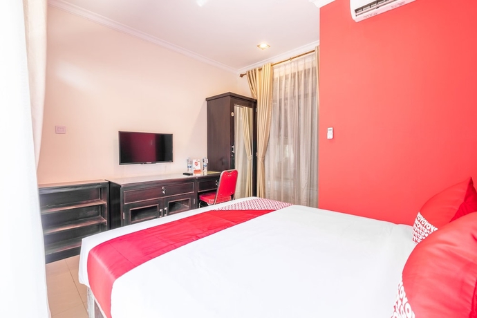 Imagen de la habitación del Hotel OYO Collection O 1032 Rahayu Residence Syariah. Foto 11