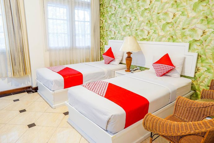 Imagen de la habitación del Hotel OYO Collection O 1452 Utari. Foto 5