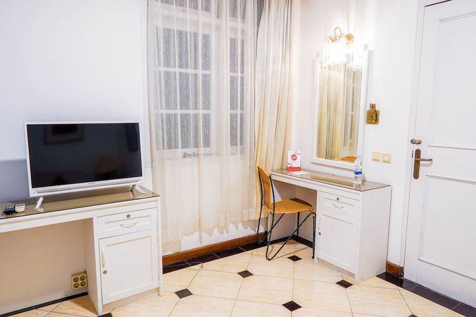 Imagen de la habitación del Hotel OYO Collection O 1452 Utari. Foto 8