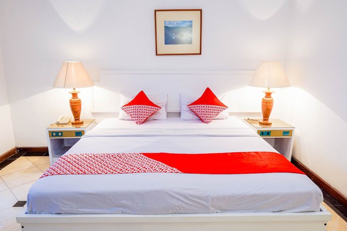 Imagen de la habitación del Hotel OYO Collection O 1452 Utari. Foto 9