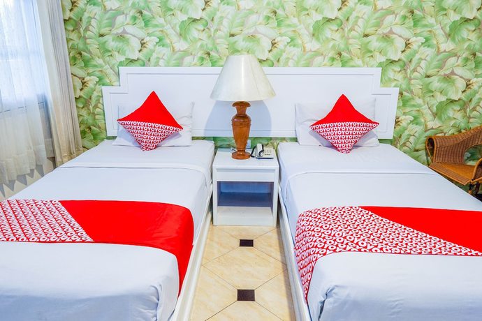 Imagen de la habitación del Hotel OYO Collection O 1452 Utari. Foto 13