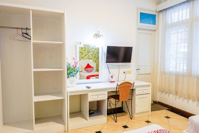 Imagen de la habitación del Hotel OYO Collection O 1452 Utari. Foto 15