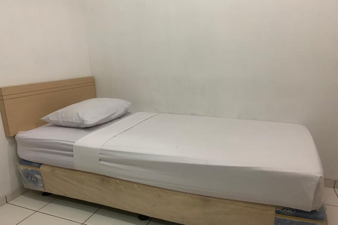 Imagen de la habitación del Hotel OYO Collection O 818 Micasa Residence. Foto 4