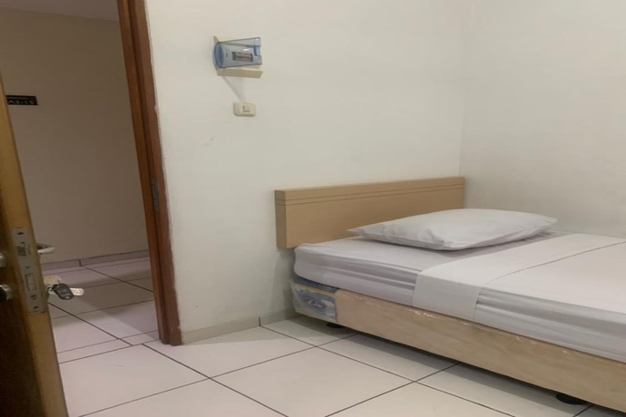 Imagen de la habitación del Hotel OYO Collection O 818 Micasa Residence. Foto 5