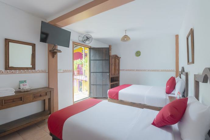 Imagen de la habitación del Hotel OYO Coyopolan. Foto 13