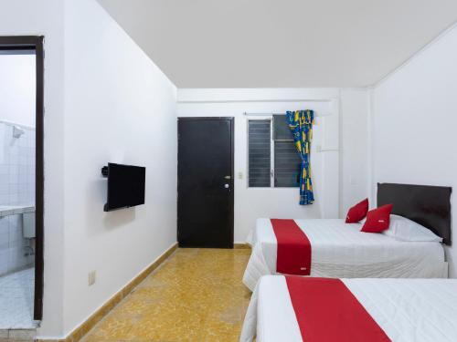 Imagen de la habitación del Hotel OYO Cristal. Foto 4