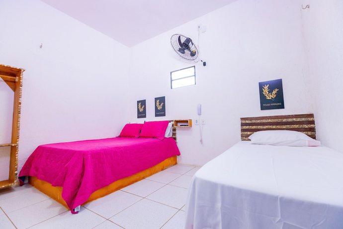 Imagen de la habitación del Hotel OYO Das Pedras. Foto 5