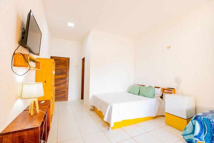 Imagen de la habitación del Hotel OYO Das Pedras. Foto 10