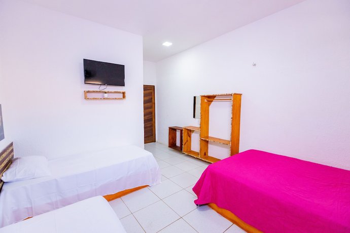 Imagen de la habitación del Hotel OYO Das Pedras. Foto 13
