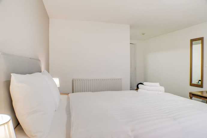 Imagen de la habitación del Hotel OYO Dayz Away Lodge. Foto 2