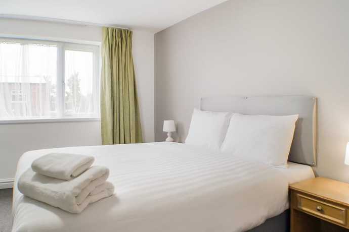 Imagen de la habitación del Hotel OYO Dayz Away Lodge. Foto 8