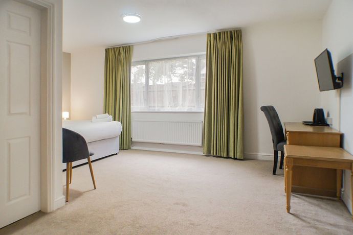 Imagen de la habitación del Hotel OYO Dayz Away Lodge. Foto 11