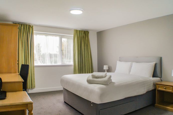 Imagen de la habitación del Hotel OYO Dayz Away Lodge. Foto 15