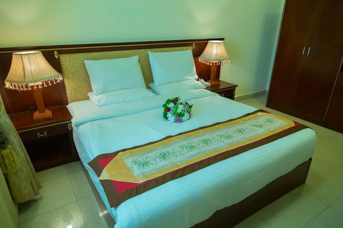 Imagen de la habitación del Hotel OYO Dream Palace. Foto 7