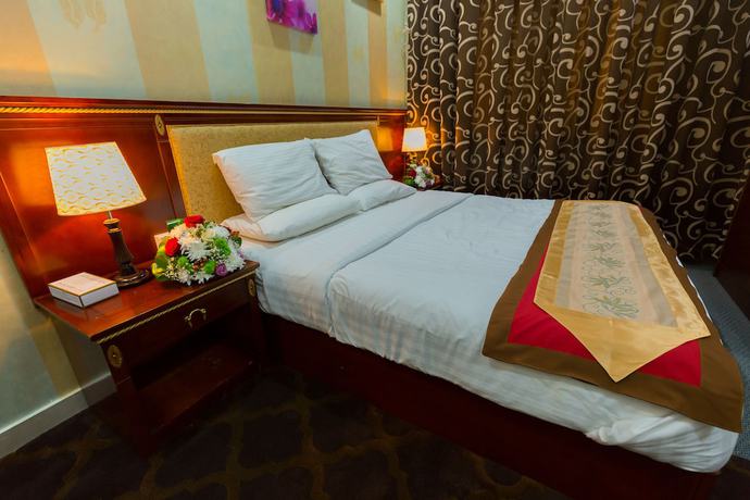 Imagen de la habitación del Hotel OYO Dream Palace. Foto 8