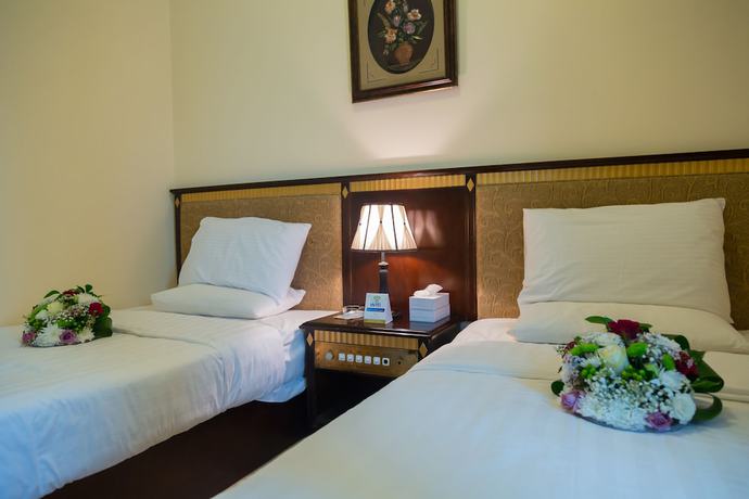 Imagen de la habitación del Hotel OYO Dream Palace. Foto 11