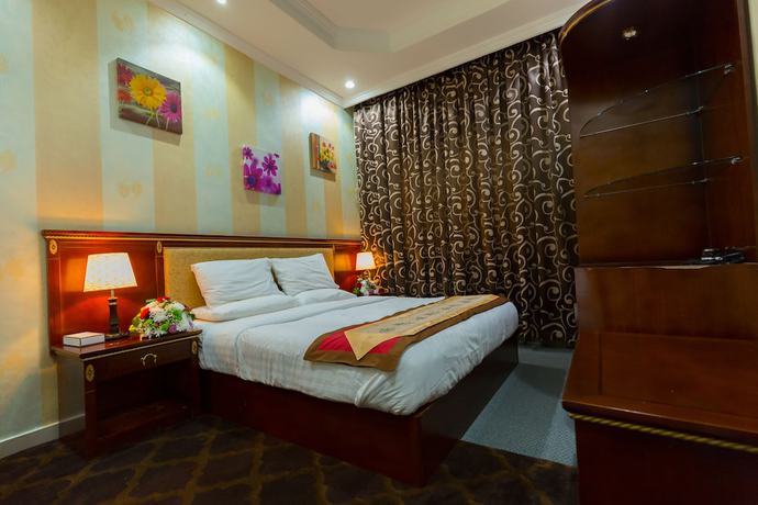 Imagen de la habitación del Hotel OYO Dream Palace. Foto 12