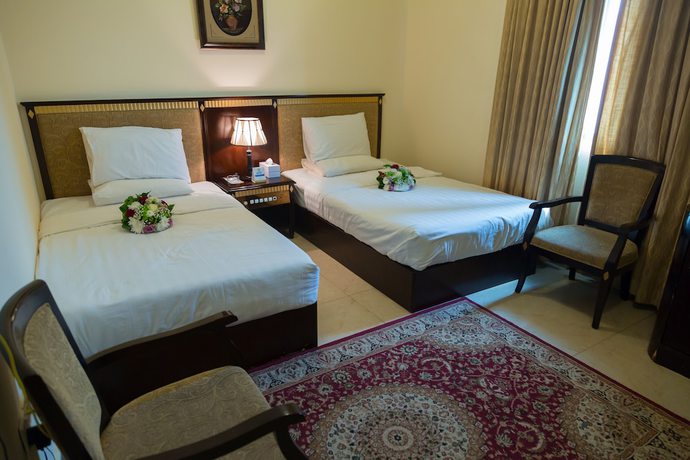 Imagen de la habitación del Hotel OYO Dream Palace. Foto 16