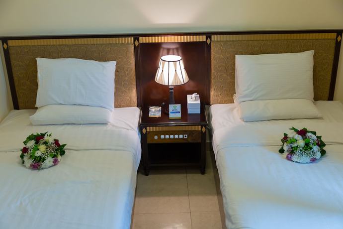 Imagen de la habitación del Hotel OYO Dream Palace. Foto 18