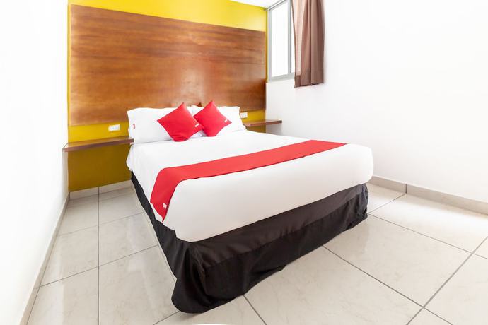 Imagen de la habitación del Hotel OYO Familiar Tollan. Foto 3
