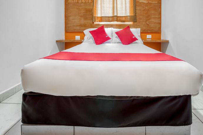 Imagen de la habitación del Hotel OYO Familiar Tollan. Foto 5