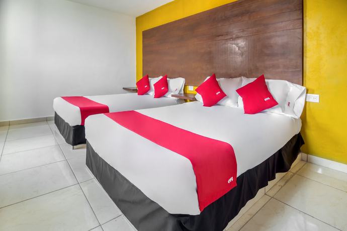 Imagen de la habitación del Hotel OYO Familiar Tollan. Foto 6