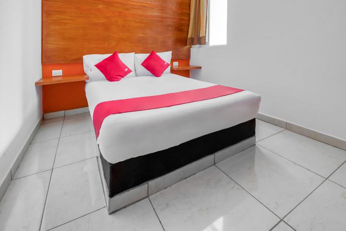 Imagen de la habitación del Hotel OYO Familiar Tollan. Foto 7