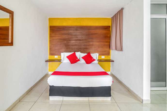 Imagen de la habitación del Hotel OYO Familiar Tollan. Foto 9