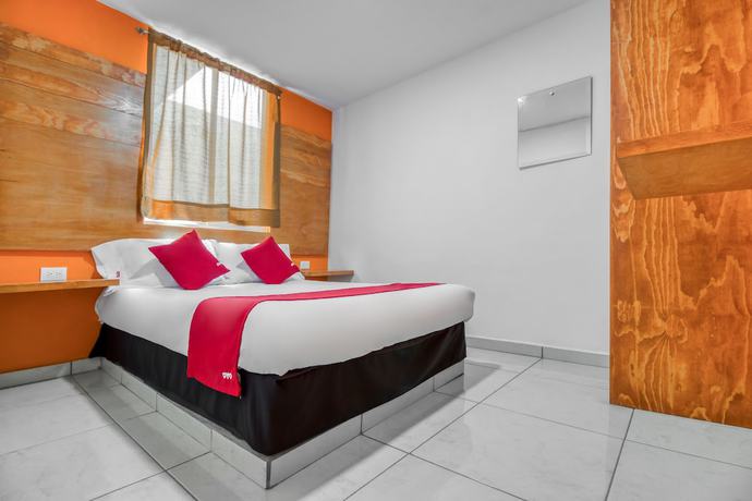 Imagen de la habitación del Hotel OYO Familiar Tollan. Foto 10
