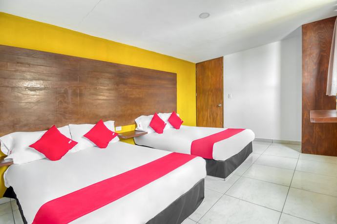 Imagen de la habitación del Hotel OYO Familiar Tollan. Foto 12