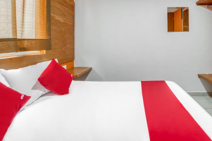 Imagen de la habitación del Hotel OYO Familiar Tollan. Foto 14